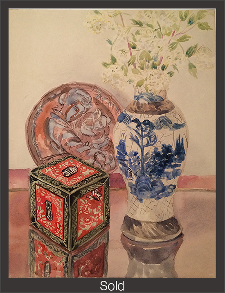 Still life of a vase, plate, and box on a reflective surface with a beige wall. The bronze plate decorated with a woman in a traditional Chinese outfit sit behind the small patterned red box, and white and blue vase with white flowers. The piece is marked as sold with a grey border and white text "Sold" at the bottom center.