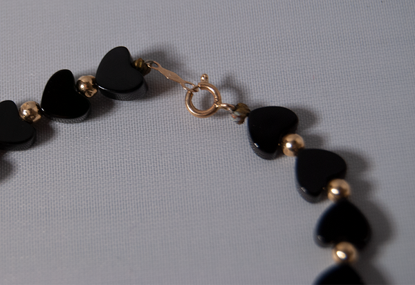 Black and gold heart bracelet