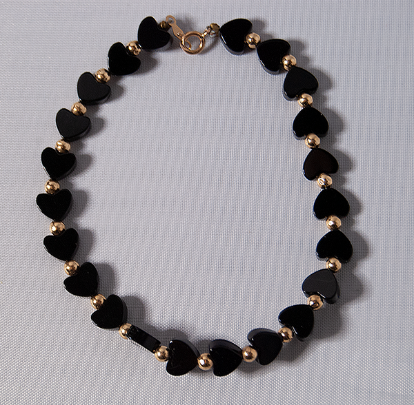 Black and gold heart bracelet