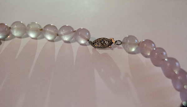 Clear pink and dark charcoal grey round beaded necklace