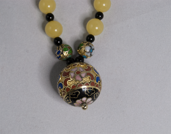 Closionné, yellow, and black bead pendant necklace