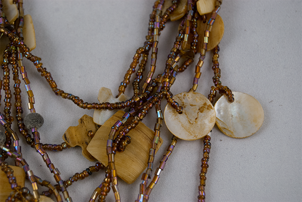 Mother of pearl and wood beaded multi-strand necklace
