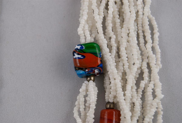 Multi-strand necklace with painted clay beads