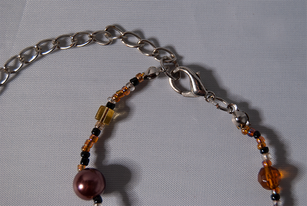 Dark rose, amber, and citrine beaded necklace