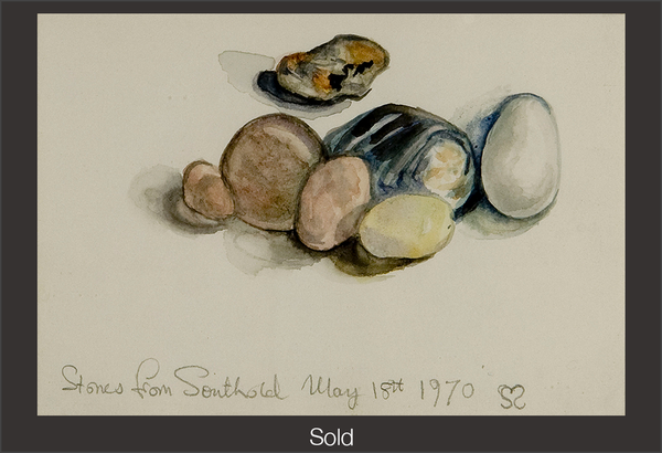 A set of 6 small and large stones on a blank surface. One patterned stone sits slightly behind the group of stones. The stones range in tones of greys, yellows, pinks, and browns. Handwritten text at the bottom says "Stones from Southold May 18th 1970" and Sylvia Sleigh's signature.