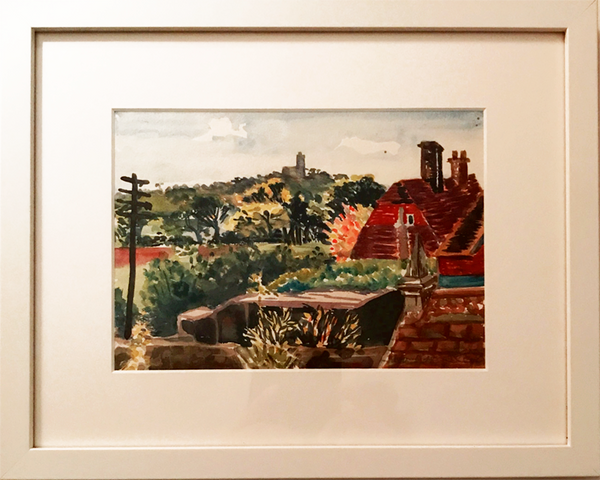 The painting in a white frame.