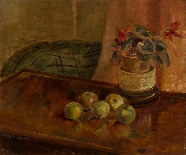 Five green apples and a vase of red flowers sit on a brown table